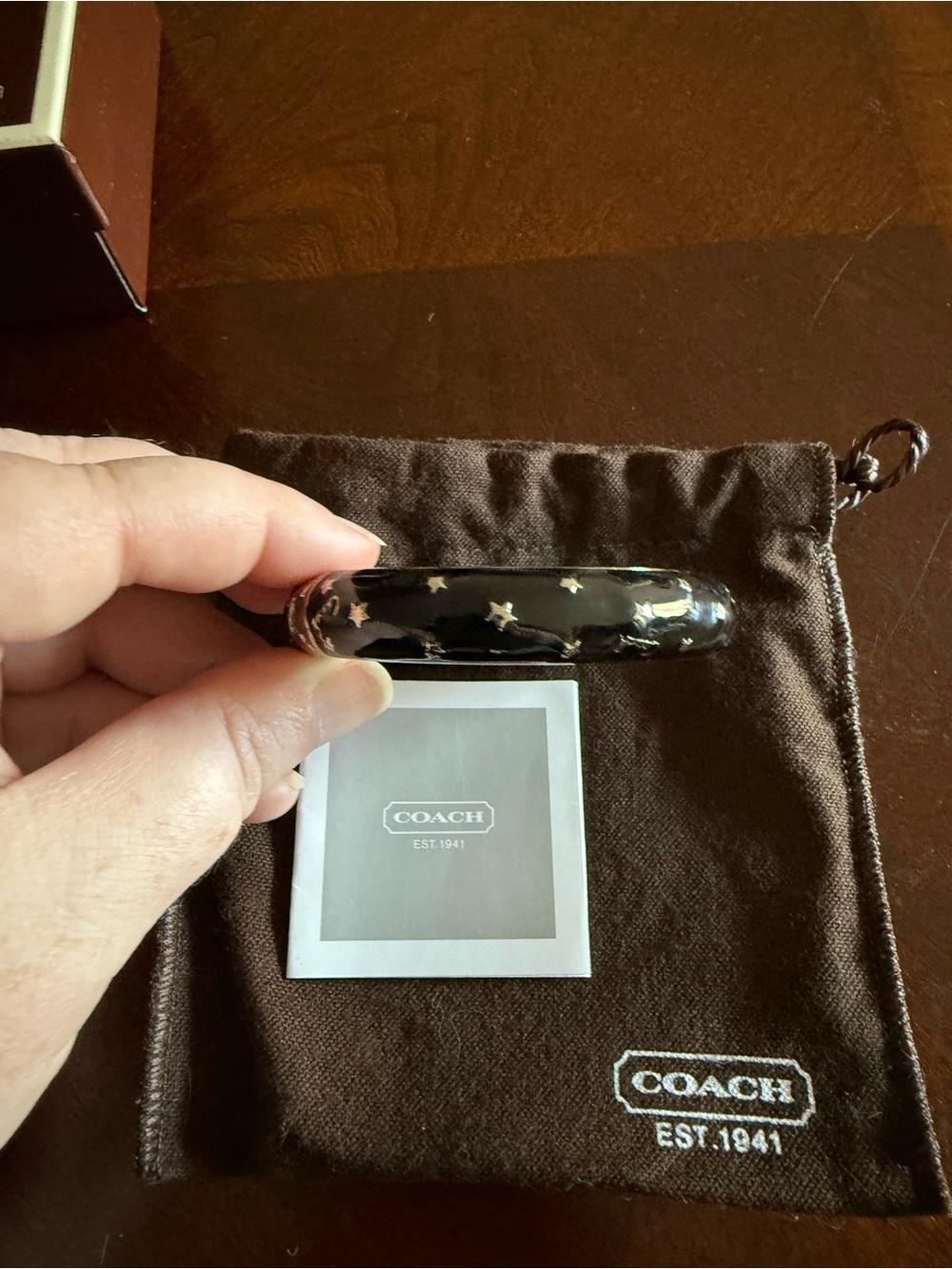 Coach Black Enamel Star-Print bracelet